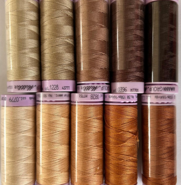 Assortiment naaigaren aarde tinten